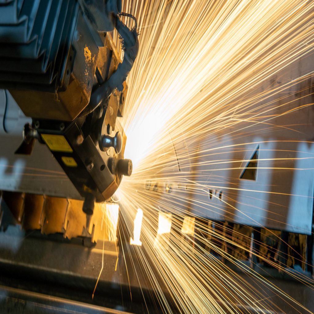 Manufacture equipment running with sparks flying.